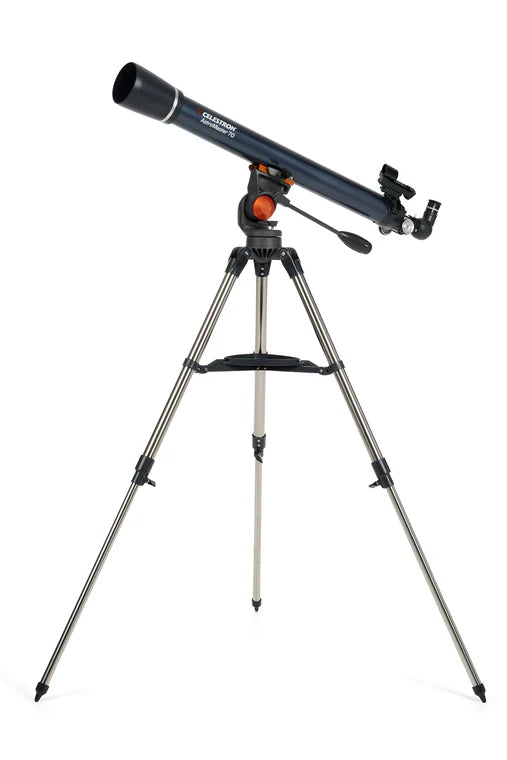 A Celestron AstroMaster 70AZ telescope with a long, blue cylindrical tube mounted on a gray altazimuth mount and silver tripod. The telescope is angled slightly upward for observation.