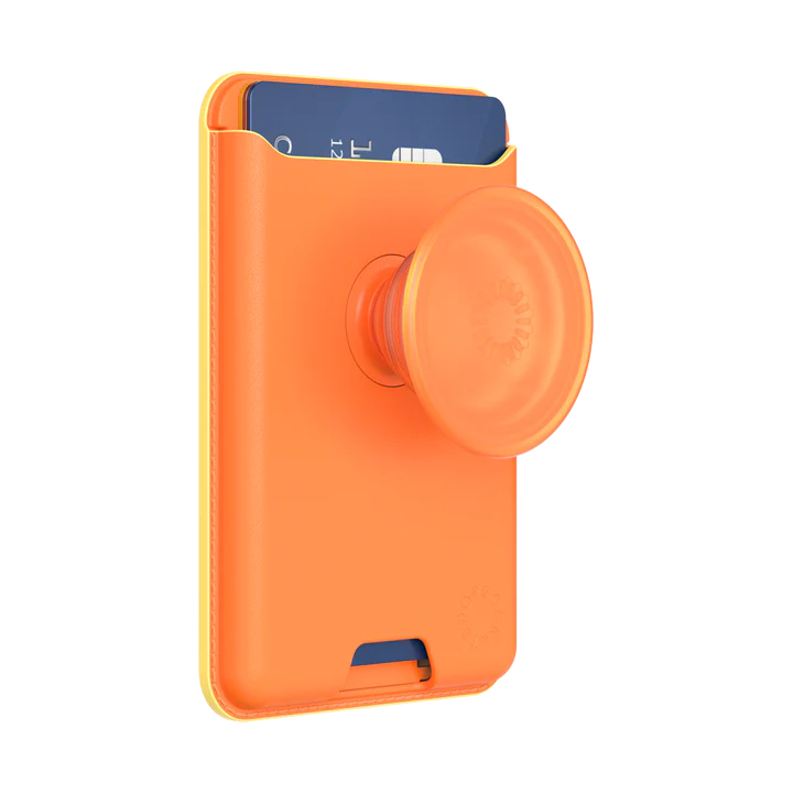 A Softgoods PopWallet for MagSafe in a vibrant cantaloupe color, holding a blue card in its pocket. The wallet features a PopGrip in the same cantaloupe color, providing a secure grip and added functionality. The PopWallet's design is sleek and practical, with a slot for easy card access.