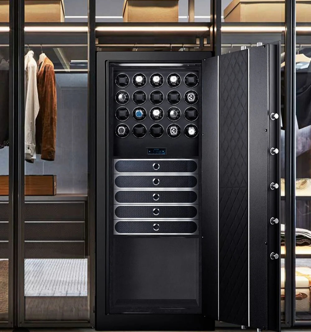 A large, open safe with a sleek black interior situated in a modern walk-in closet. The top section features eighteen watch winders with some holding watches. Below the watch winders are five drawers with sleek metallic handles for organized storage. The interior of the door has a quilted pattern with visible locking bolts, emphasizing both security and style. The safe is set against a backdrop of neatly organized shelves and hanging clothes, highlighting its integration into a luxurious living space.
