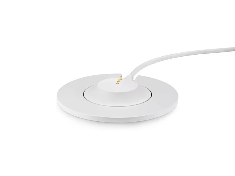 White electronic device with a cable on a black background