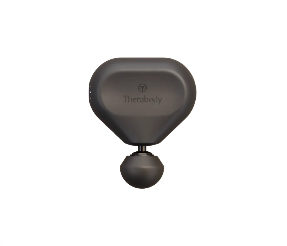 Black Therabody device on a beige background