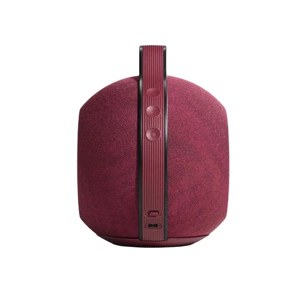 Red portable speaker with a textured finish on a white background