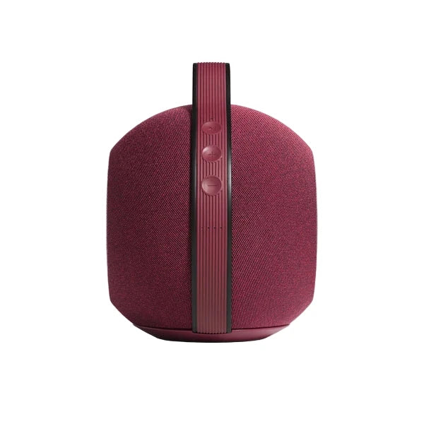 Maroon portable speaker with a textured finish on a white background