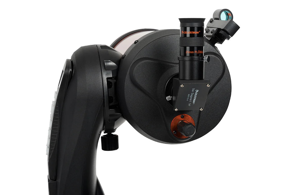 A close-up view of the back of a Celestron NexStar 6SE telescope, showing the eyepiece and focus knobs. The eyepiece is labeled "Celestron 25mm PL," and is attached to the back of the orange cylindrical tube.