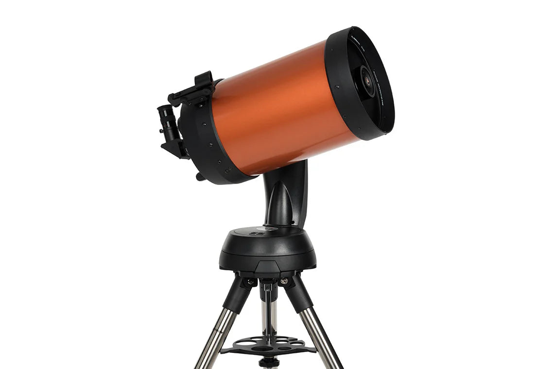 A Celestron NexStar 8SE telescope with an orange cylindrical tube mounted on a black computerized base and tripod. The telescope is angled upwards for observation. The base provides stability and features advanced tracking and alignment capabilities. The eyepiece and other controls are positioned at the back of the telescope tube. The overall design is sleek and robust, ideal for astronomical observation
