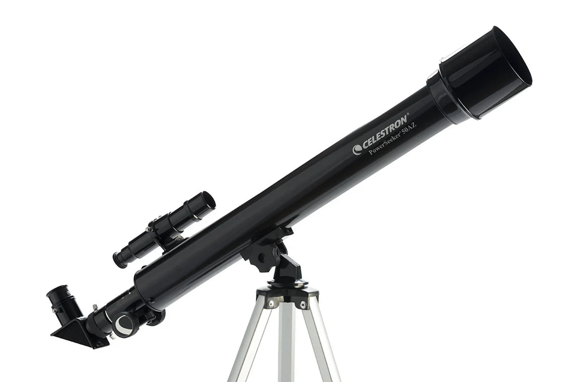  A Celestron PowerSeeker 50AZ telescope with a black cylindrical tube mounted on a silver altazimuth mount and tripod. The telescope is angled slightly upward for observation. A finderscope is mounted on top of the tube