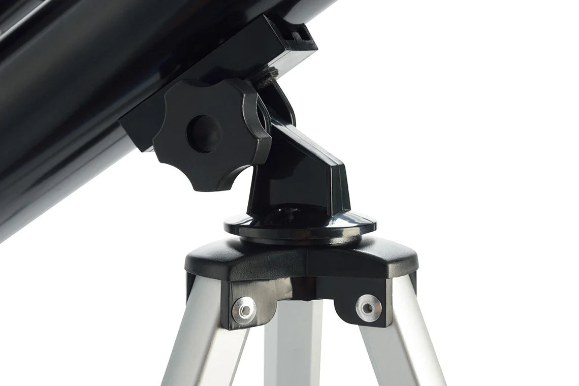 A close-up view of the mount of a Celestron PowerSeeker 50AZ telescope. The black cylindrical tube of the telescope is partially visible, connected to the mount with a large black adjustment knob for positioning the telescope