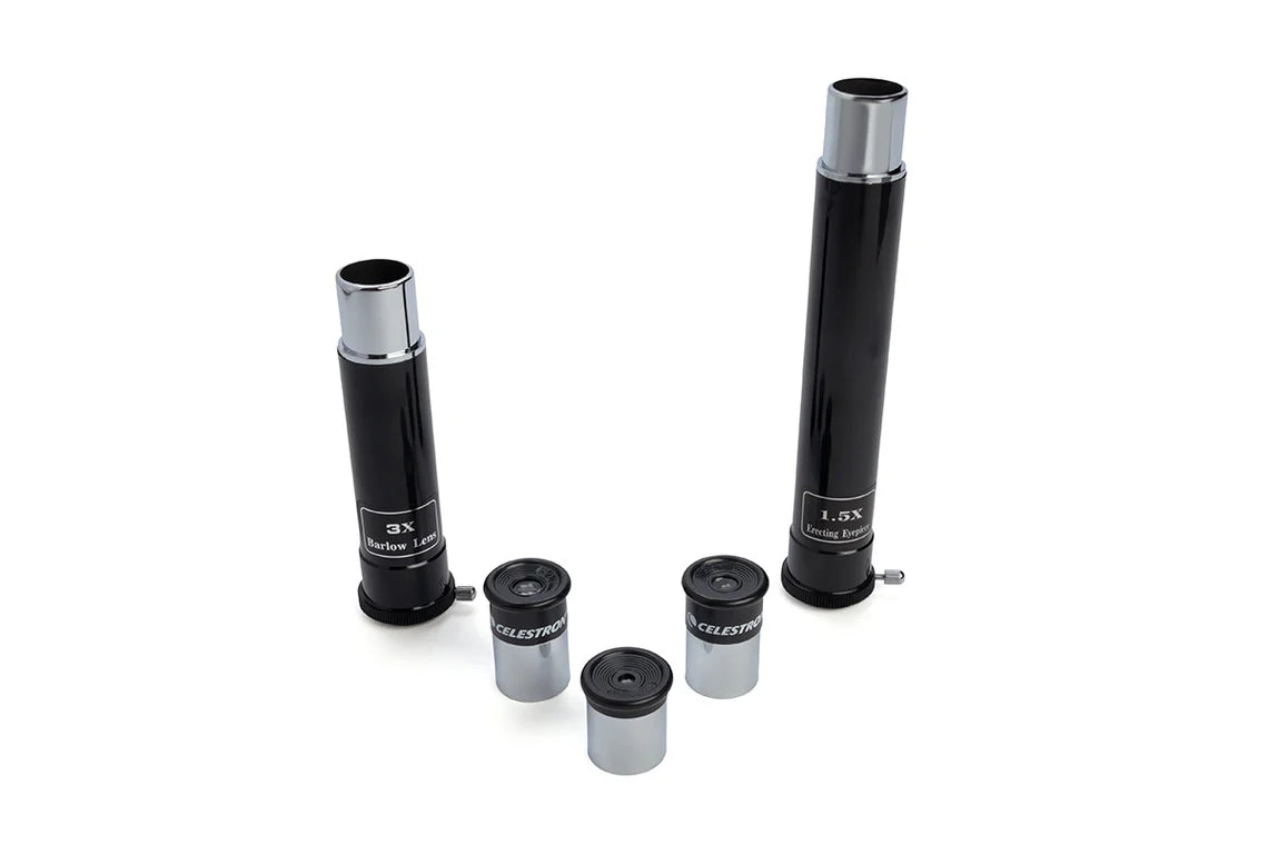 Two long Celestron telescope eyepieces labeled "3X Barlow Lens" and "1.5X Erecting Eyepiece" stand upright on a white background. In front of them are three shorter Celestron eyepieces, each with a black upper section and a silver lower section, designed for inserting into the telescope.