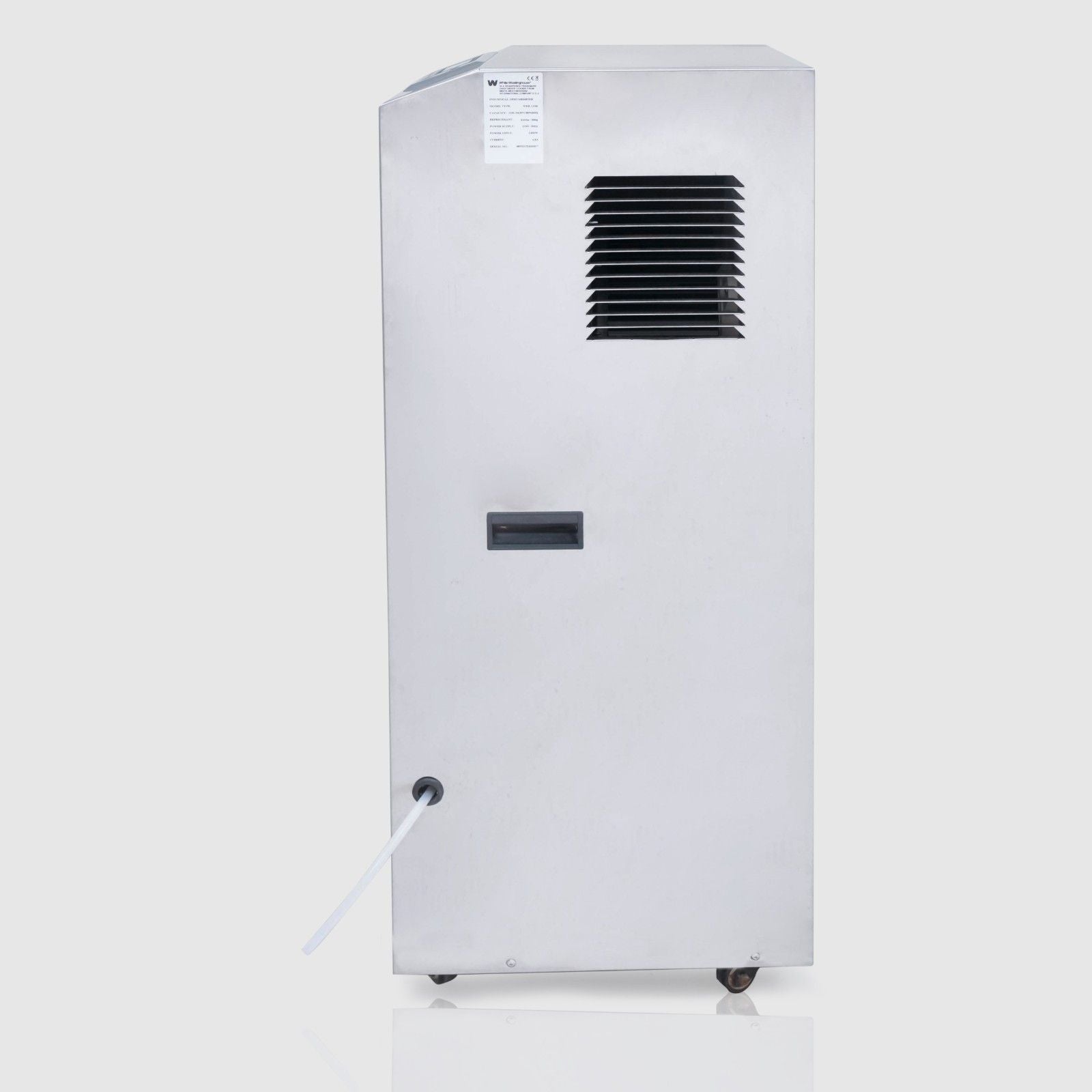 The side view of a White-Westinghouse industrial dehumidifier with a metallic silver exterior. The side panel features a series of angled ventilation slats near the top, a handle in the middle for easy transport, and a drainage hose attachment near the bottom. The unit is mounted on small wheels for mobility. A label with product information is affixed near the top.