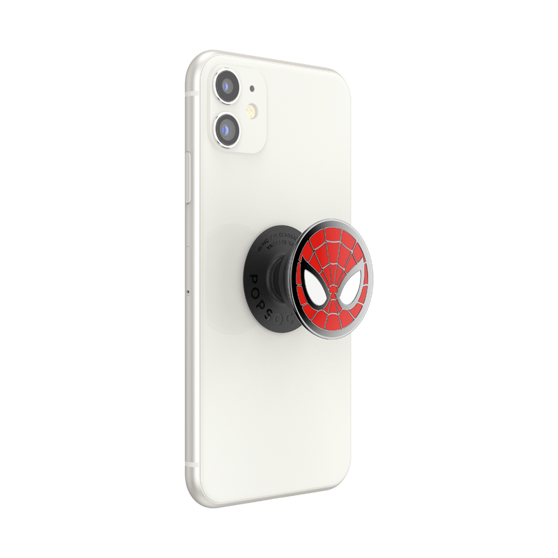  A white smartphone with an attached Enamel Marvel Spider-Man PopGrip in an extended position. The PopGrip features the iconic Spider-Man mask design with a red background, black web lines, and large white eyes outlined in black. The grip is centrally positioned on the back of the phone, showing its circular shape and glossy finish. The phone's camera cutout is visible.