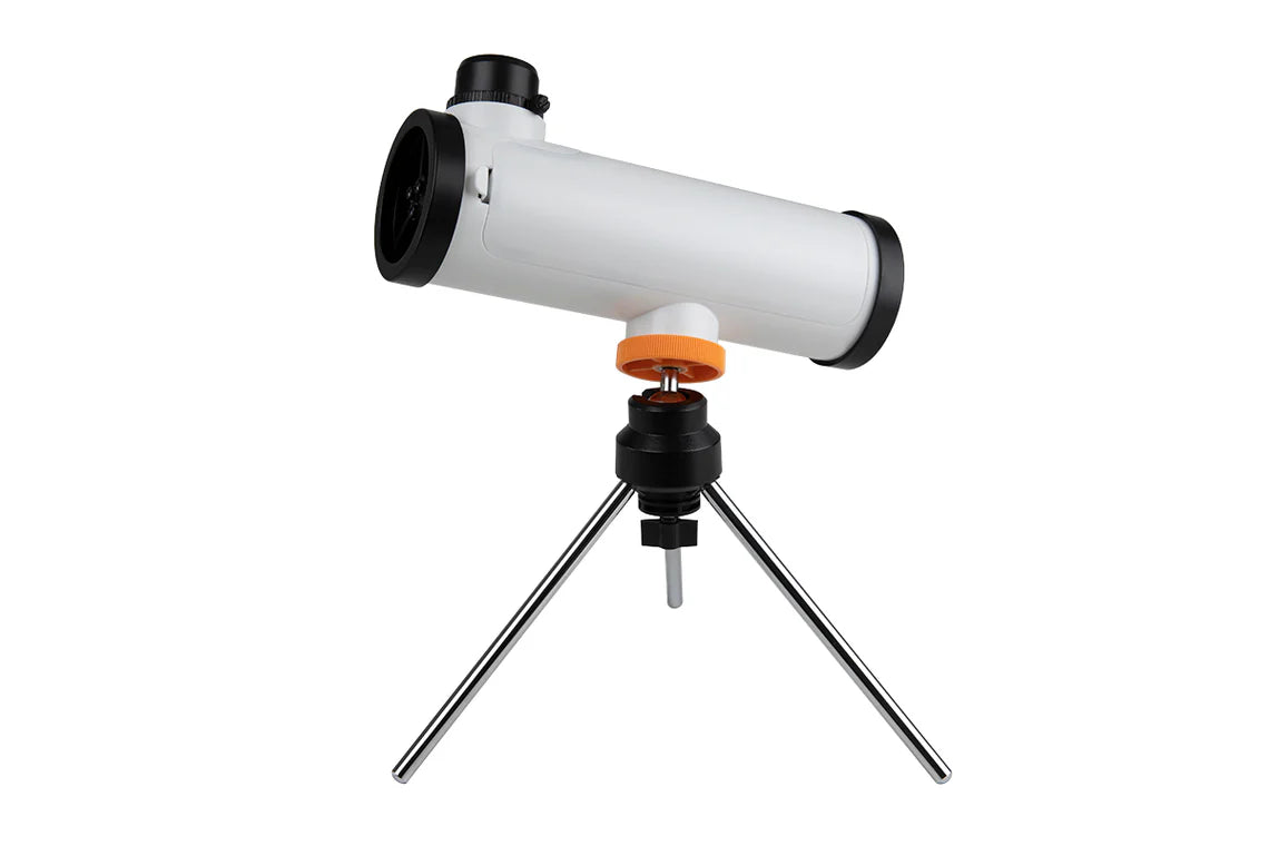  A rear view of the Celestron Kids STEM 50mm Newtonian Telescope. The telescope has a white cylindrical tube mounted on a small tripod. The eyepiece is positioned at the top rear of the tube. The tripod features silver legs with a black mount and an orange adjustment knob for positioning. 