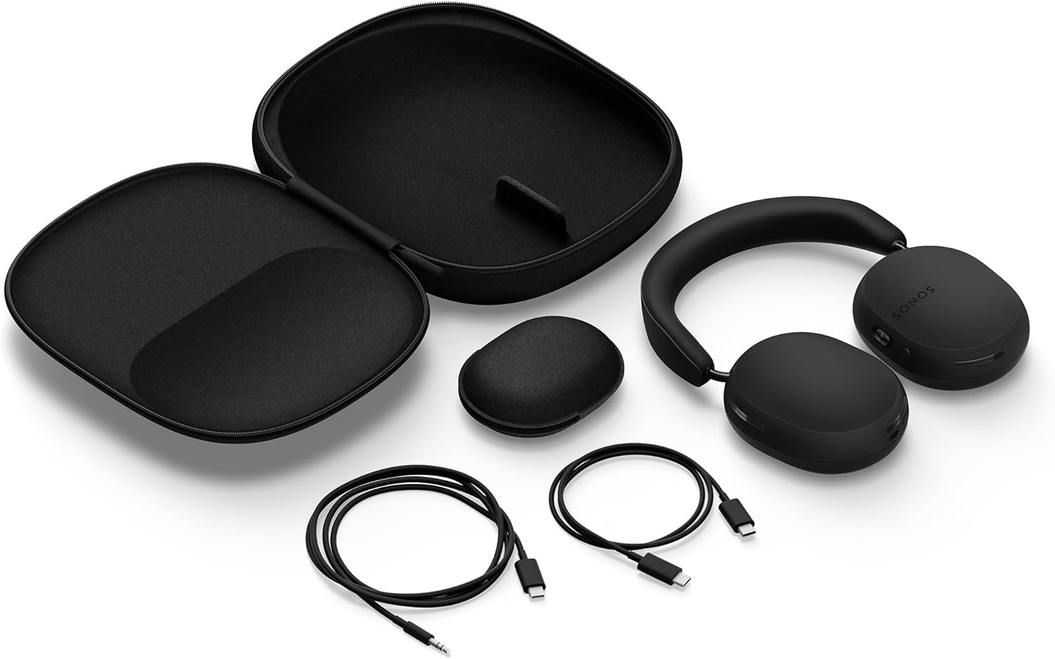 Sonos wireless over-ear headphones with accessories including charging cables, protective carrying case, and additional earbud case.