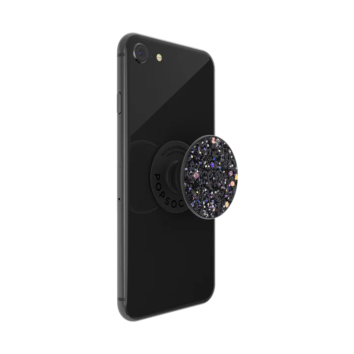 Black smartphone with a PopSockets Sparkle Black PopGrip attached to the back. The PopGrip features a top covered in black glitter with multicolored reflective sparkles. The phone is shown from the back at a slight angle, with the PopGrip extended outward, highlighting its sparkly design.