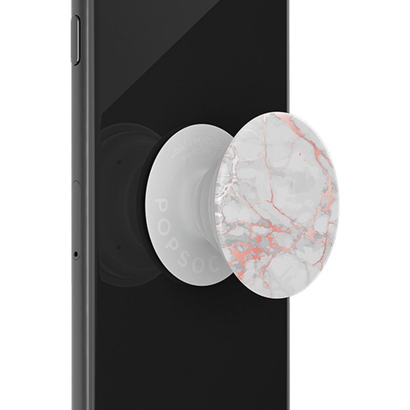 A PopSockets PopGrip with a Rose Gold Lutz Marble design attached to the back of a black smartphone. The grip features a white and light grey marble pattern with rose gold veining, extending outwards to show its expanding function.