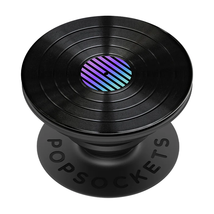 PopSockets Retro Vinyl Backspin PopGrip featuring a black vinyl record design. The top of the PopGrip has circular grooves mimicking a vinyl record, with a small central label that has a gradient pattern of blue and purple stripes. The base of the PopGrip is black with the word "POPSOCKETS" embossed on it.