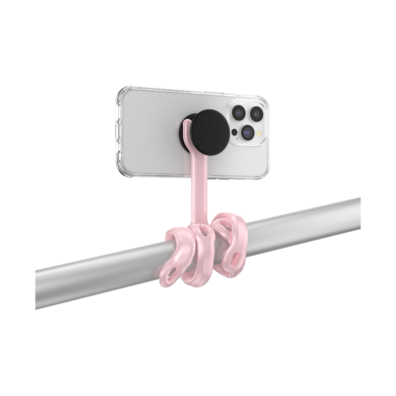  PopSockets Flex Mount in Pinky color holding a smartphone in a clear case with a black PopGrip attached to the back. The mount's flexible legs are wrapped around a horizontal metal bar, securing the smartphone in a horizontal position. The phone is shown from the back, highlighting the PopGrip and the light pink colored flexible mount's secure attachment.