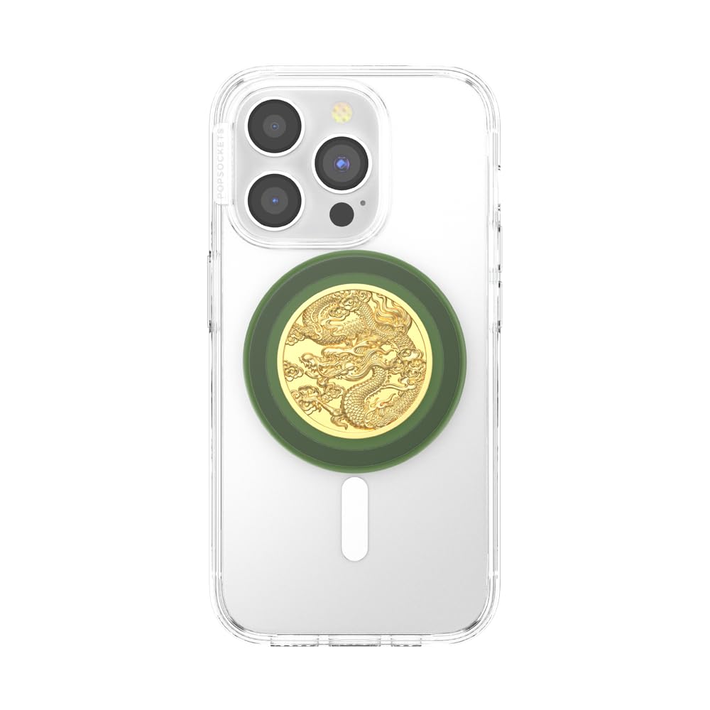 A smartphone with a clear case featuring a green circular pop-up grip adorned with an intricate gold dragon design, combining elegance and functionality for secure handling and a unique aesthetic.