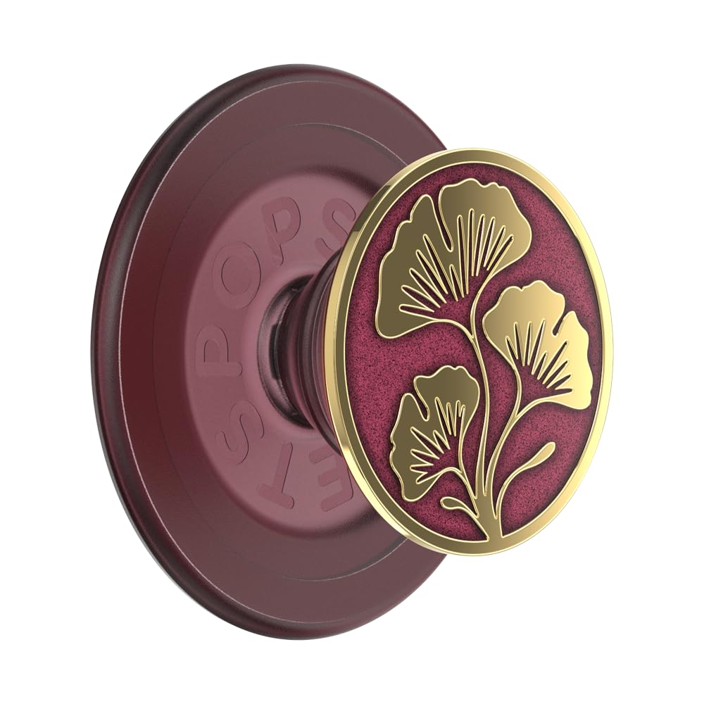 This image showcases a **PopSocket** featuring an elegant design with **golden ginkgo leaves** against a **deep red background**. The circular base and expanding grip complement the rich maroon shade, enhancing the visual appeal. The intricate details of the leaves add a sophisticated and stylish touch, making it both functional and aesthetically pleasing.