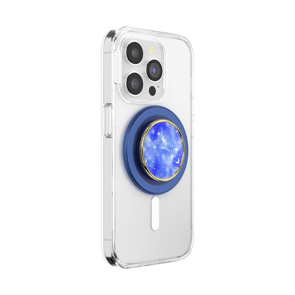 A smartphone with a clear case featuring a cosmic-themed PopSocket grip in blue with a gold metallic rim. The grip showcases a starry design with crescent moons and twinkling stars, blending celestial beauty with practical functionality.