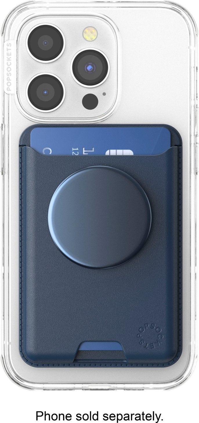 A clear phone case with a navy blue leather PopSockets MagSafe Softgoods PopWallet attached to the back. The PopWallet features a circular PopSocket and a partially inserted blue card, showcasing its functionality and sleek design. The phone's triple camera system is visible above the wallet.