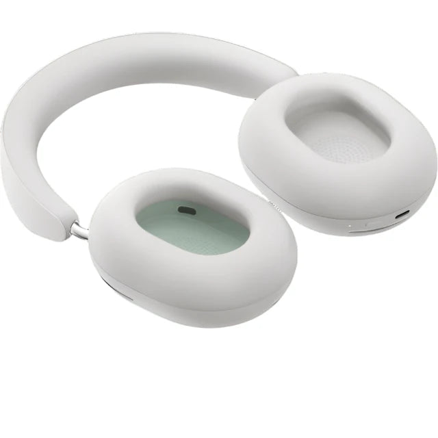 White Sonos wireless over-ear headphones folded flat, featuring cushioned ear cups and sleek, ergonomic design for easy storage.