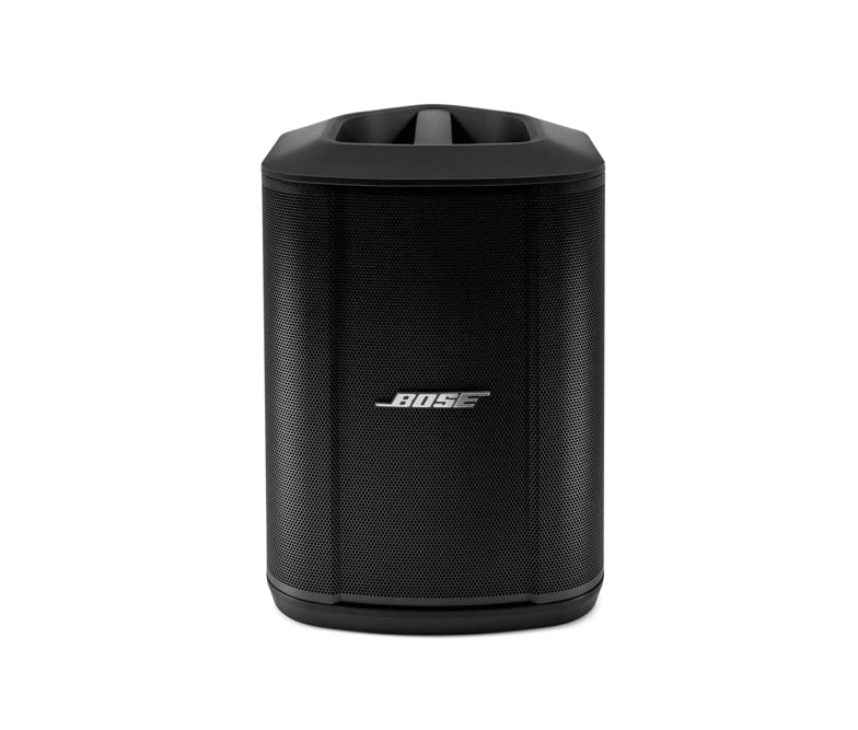 Front view of a black Bose speaker with a sleek, curved design. The front grille prominently displays the Bose logo. The top of the speaker has a built-in handle for easy portability. The overall design is modern and functional, emphasizing portability and ease of use.