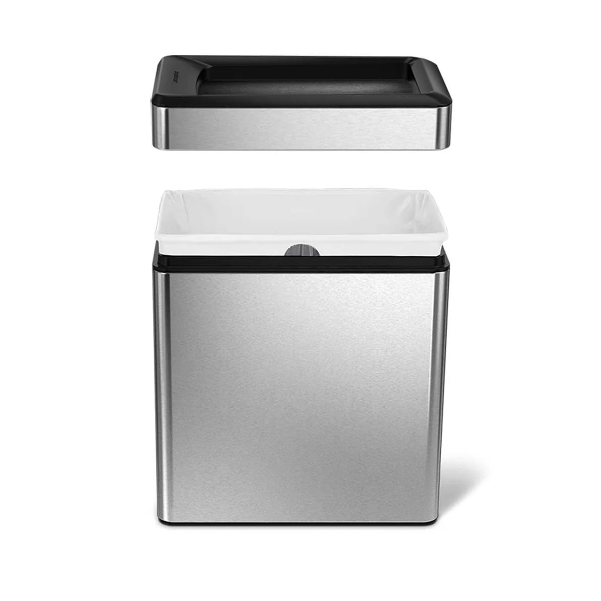 The image displays a rectangular stainless steel trash can with a removable lid. The lid, which is shown detached and positioned above the can, has a sleek black top with a stainless steel rim, highlighting its modern design. The trash can's body is also made of stainless steel, with clean, smooth lines and a polished finish. Inside the can, a white trash bag is neatly placed, indicating the ease of lining and maintaining the bin. The design is both functional and stylish, making it suitable for kitchens, o