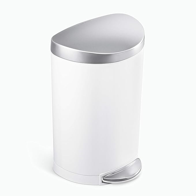 A modern white trash bin with a rounded, sleek stainless steel lid and a sturdy foot pedal for easy and hygienic use.