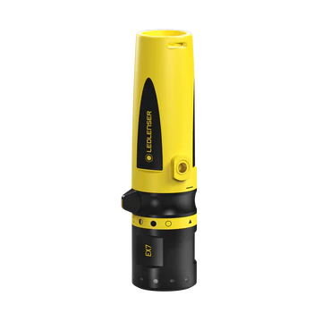 LEDLenser EX7 flashlight, vertical view, highlighting its elongated yellow and black body, designed for safe use in explosive environments with a sturdy, focusable lens and ergonomic grip.