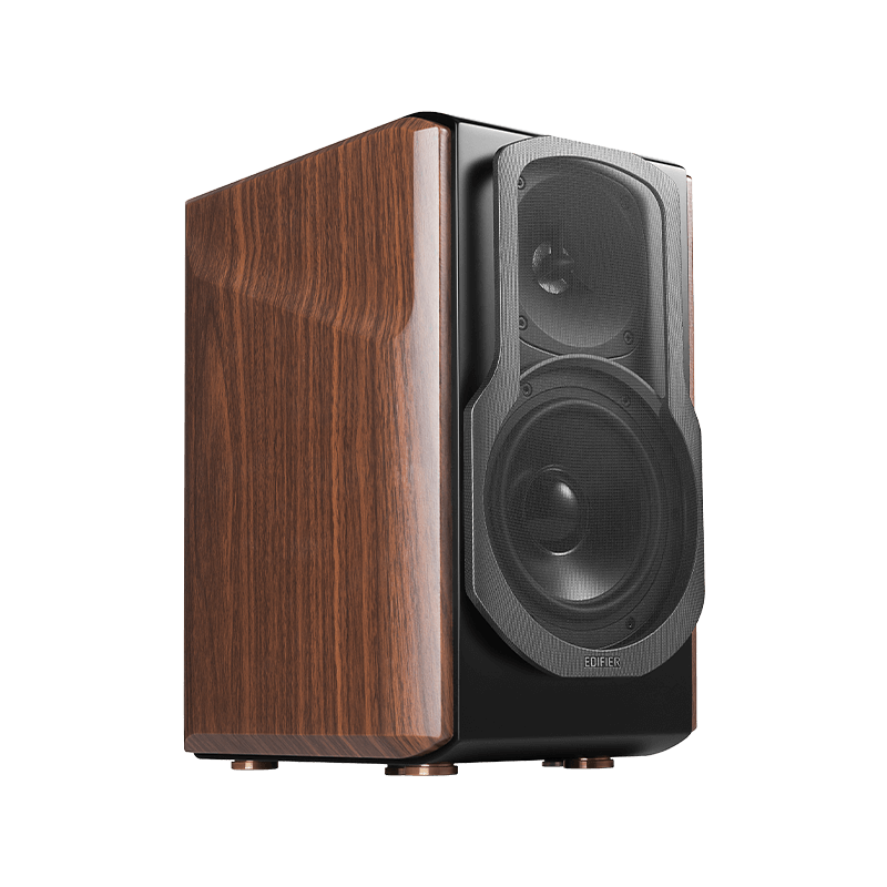 This is an elegant high-quality speaker with a modern design. The side features a polished wood finish, while the front houses a black panel with a tweeter and woofer, designed for excellent sound quality. Its refined aesthetics make it ideal for both professional audio environments and stylish home setups.