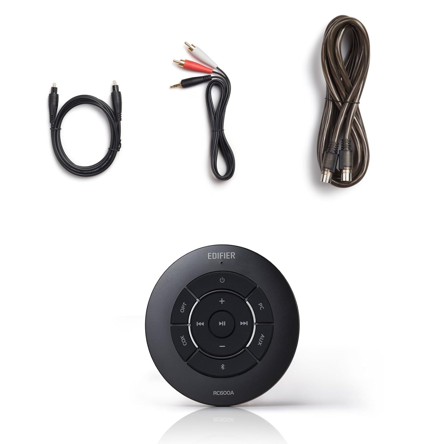 A set of audio accessories including a circular Edifier remote control with multiple input selection buttons such as "OPT," "COAX," "PC," and "AUX" surrounding a central play/pause button. Above the remote, three different types of cables are displayed: a short black optical cable with metal connectors, a dual RCA cable with red and white connectors, and a long coaxial cable with metallic connectors. The items are arranged neatly on a white background.