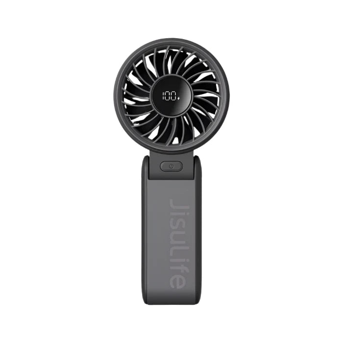 The image displays a black Jisulife portable fan with a compact, foldable design. The fan features a circular grill with multiple blades, and a digital display in the center of the grill shows a battery level of "100%." The body of the fan has a sleek, matte finish with the brand name "Jisulife" printed vertically. The design is modern and portable, making it ideal for on-the-go use.