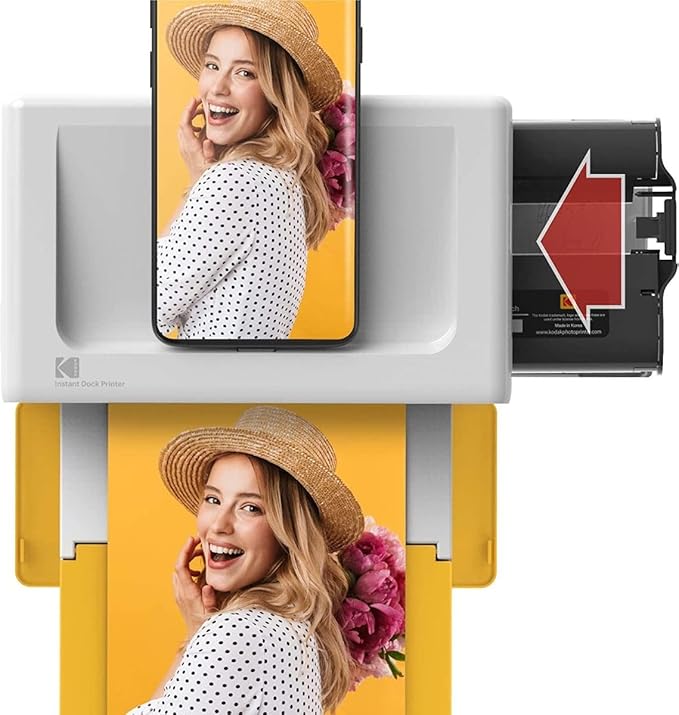 This image showcases a Kodak instant dock printer, demonstrating its seamless integration with a smartphone to print high-quality photos. The setup highlights the simplicity of printing directly from a mobile device, featuring a vibrant photo being processed. The printer is predominantly white with yellow accents, emphasizing its modern and stylish design, perfect for quick, high-resolution photo prints.