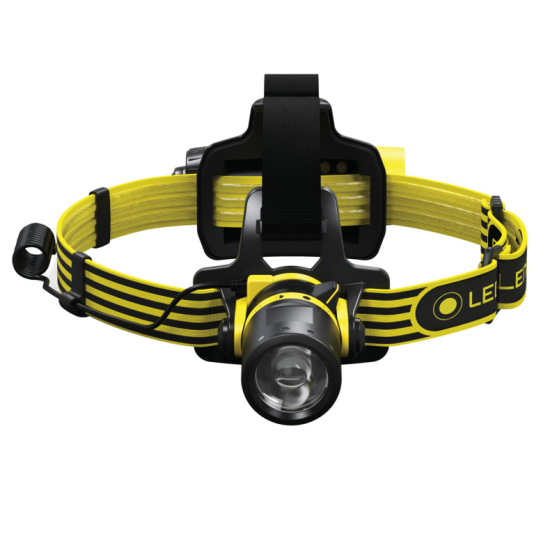 A LEDLenser yellow and black headlamp with an adjustable strap and a front-mounted LED light. The headlamp features a sturdy design, suitable for hands-free use in various activities.