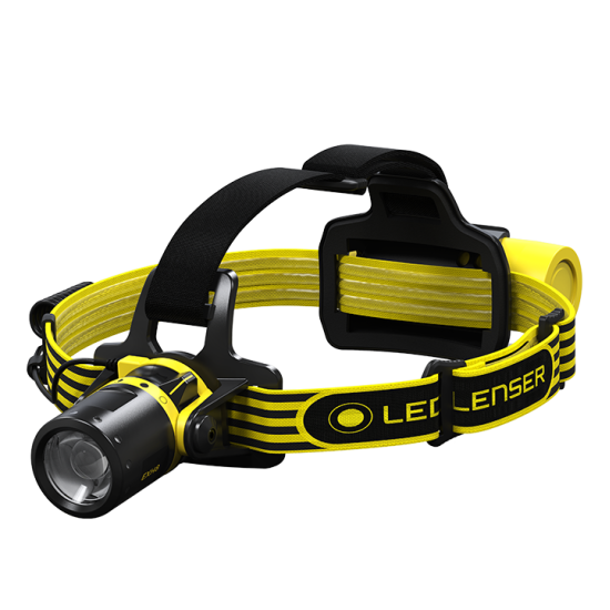  The LEDLenser EXH8 headlamp features a bright yellow and black design with an adjustable strap for secure and comfortable wear. The headlamp includes a focused lens at the front for a powerful beam, and the LEDLenser logo is visible on the strap, indicating the brand and model of the device. 