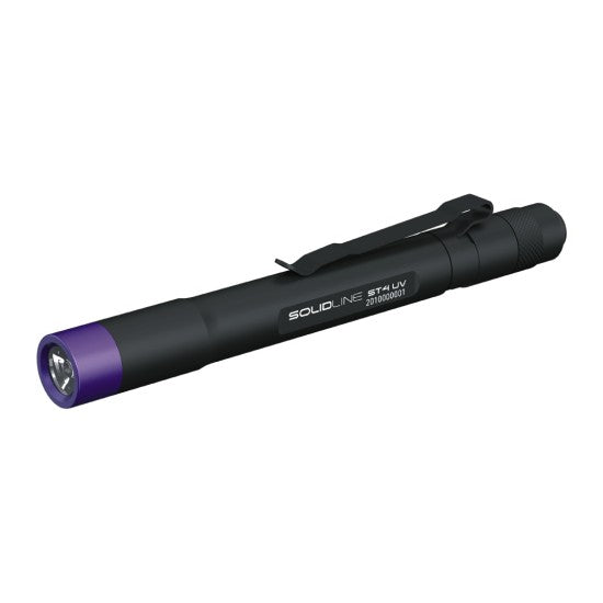 A black SOLIDline penlight with a purple accent near the LED light. The penlight features a clip for easy carrying. The model name "SOLIDline ST4 UV" and "395 nm UV" are printed on the side of the penlight along with a serial number "201908001."