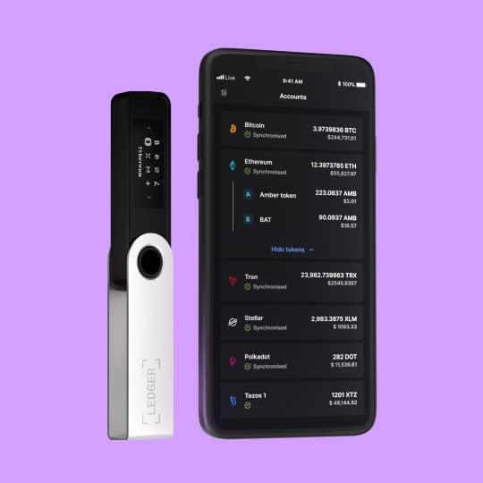 The image shows a Ledger Nano S Plus hardware wallet next to a smartphone that displays the Ledger Live app interface. The Ledger device has a sleek design with a black and silver body, with the Ledger logo engraved on the silver part. The screen on the Ledger device is active, showing the typical dot-matrix interface.