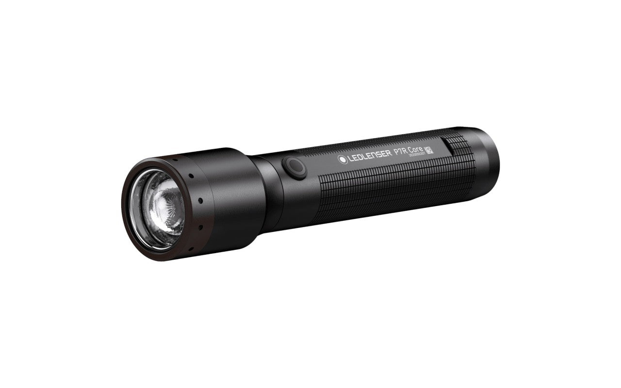  A black LED flashlight labeled "LEDLENSER P7R Core." The flashlight features a textured grip for easy handling and a single button near the head for operation. The head of the flashlight has a clear lens, indicating a powerful light source. The design is sleek and durable, suitable for various lighting needs.