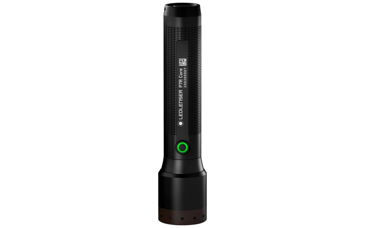  A black LED flashlight labeled "LEDLENSER P7R Core" viewed from the side. The flashlight features a textured grip for easy handling and a green power button near the head. The head of the flashlight is designed with a clear lens, indicating a powerful light source. The overall design is sleek and durable, suitable for various lighting needs.