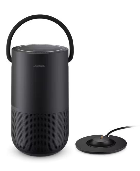 Black portable air purifier with a handle on a white background