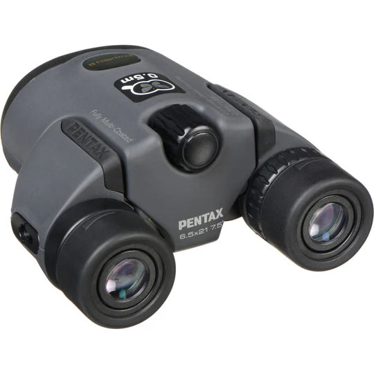 Pentax 6.5x21 binoculars featuring a compact and ergonomic design, ideal for outdoor activities and birdwatching with high-quality optics for clear and sharp viewing