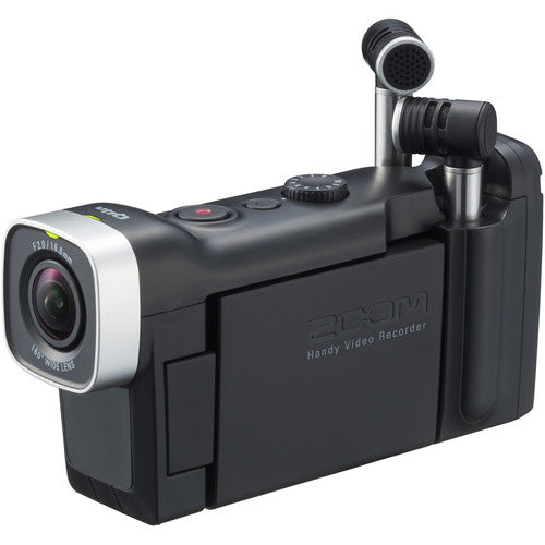 Zoom Q4n Handy Video Recorder showing its wide lens, flip-out screen, and dual microphones on each side from an angled view.