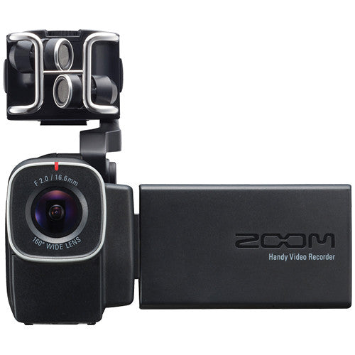 Zoom Q8 Handy Video Recorder front view, featuring a 160° wide-angle lens and a flip-out LCD screen to the right. The top-mounted microphone is visible, enhancing audio capture quality.