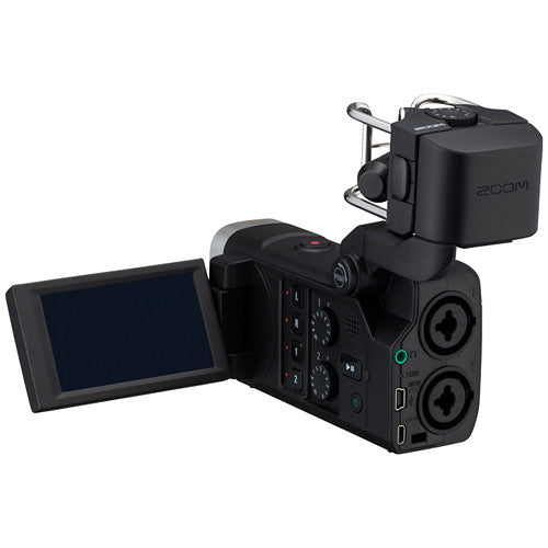 Rear and side view of the Zoom Q8 Handy Video Recorder with the LCD screen flipped open, showing the dual XLR/TRS combo inputs, USB port, and control buttons for easy access and monitoring.