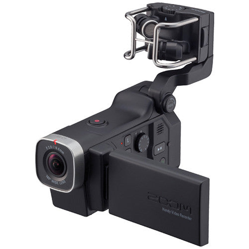 Zoom Q8 Handy Video Recorder with a 160° wide-angle lens, top-mounted microphone, and a flip-out LCD screen, shown in a side view with the screen partially open.