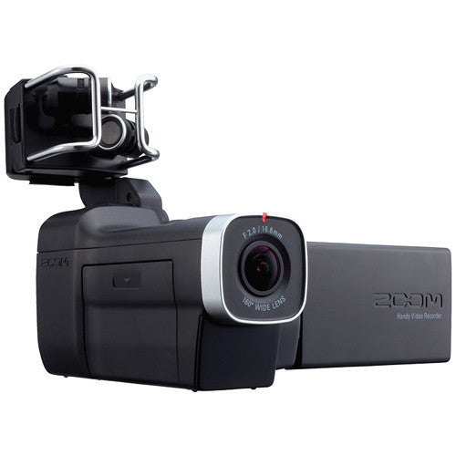 Zoom Q8 Handy Video Recorder with its wide-angle lens, open LCD screen, and top-mounted microphone shown in an angled front view.