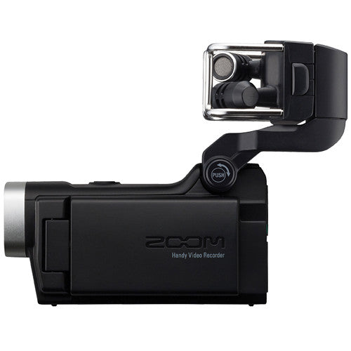 Side view of the Zoom Q8 Handy Video Recorder showcasing the LCD screen in a closed position, the compact design, and the top-mounted microphone.