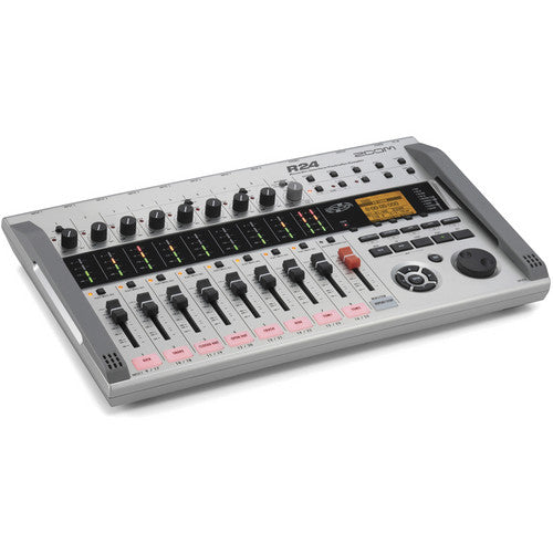 - A close-up view of a Zoom R24 multi-track recorder and audio interface, showcasing its control panel with various faders, knobs, and buttons. The device features an LCD screen, multiple input channels, and a sleek, compact design suitable for professional audio recording and mixing.