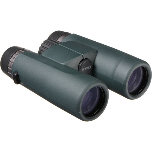 A pair of Ricoh Pentax AD 10x36 WP binoculars with a sleek, ergonomic design. The binoculars feature large objective lenses with a slight greenish tint and a durable body with a matte green finish. The Pentax branding is prominently displayed on the side of the left barrel. The central focusing wheel is positioned between the two barrels for easy adjustment. The binoculars are designed for a comfortable grip and handling, emphasizing high-quality optics and durability.