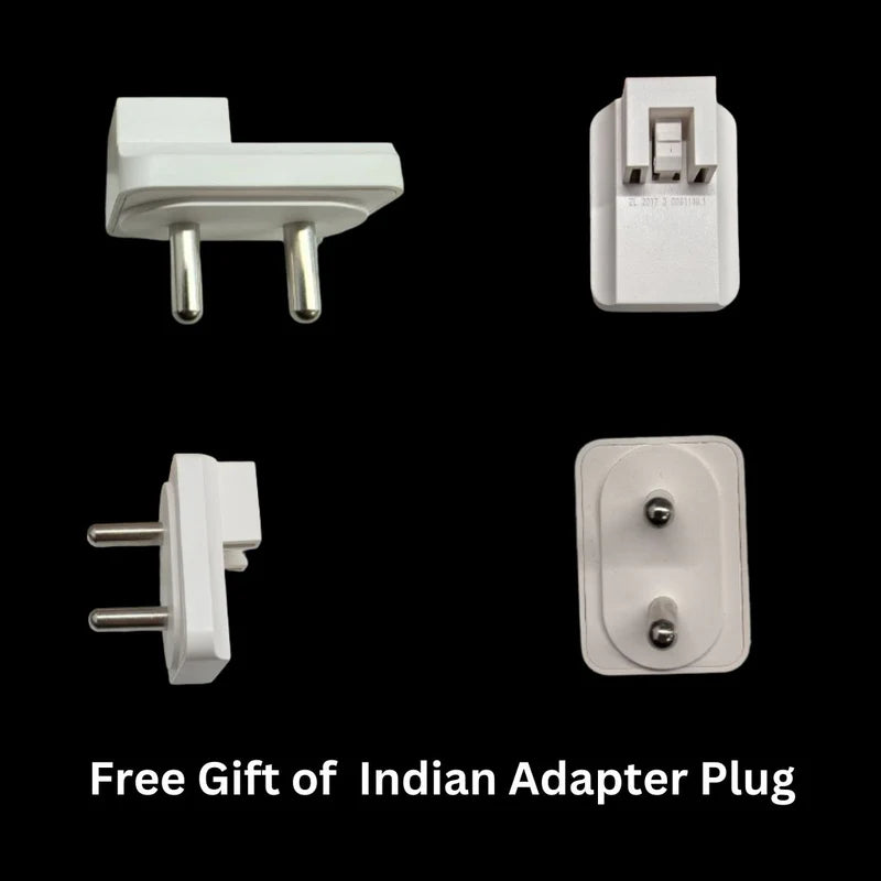 White Indian adapter plug shown from multiple angles against a black background. The text at the bottom states "Free Gift of Indian Adapter Plug," highlighting its inclusion as a complimentary accessory.